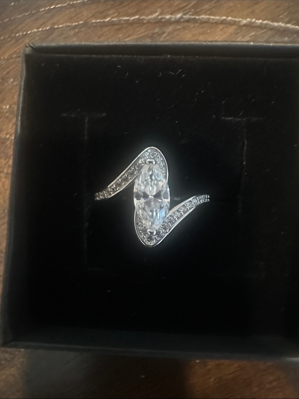Classic Marquise Halo Twist Ring in Silver with Moissanite Diamond